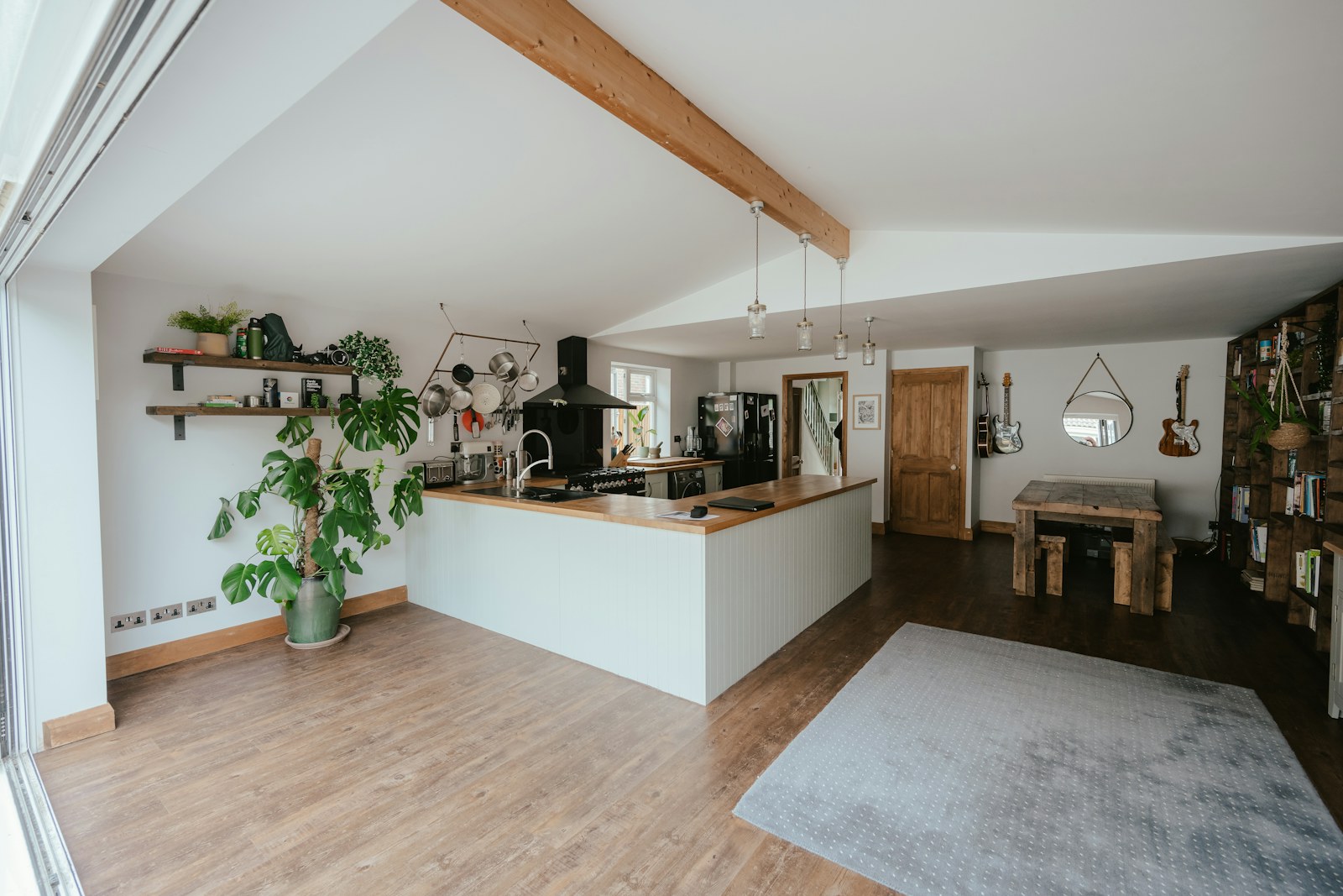 Warm modern home interior featuring wood flooring
